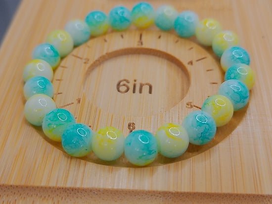 White, Blue, and Yellow Elastic Bracelet – product view 2 by LV Homemade