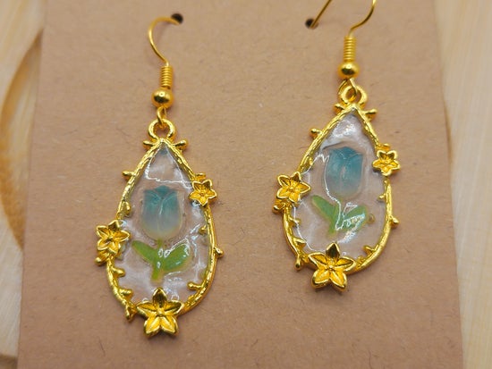 Green tulips in resin with gold flowers
