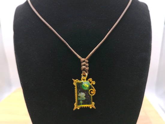 Emerald rose pendant